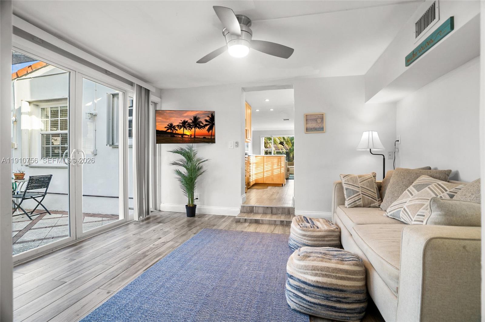 1611 Mayo Street Hollywood, FL 33020 - Photo 12 of 20 a living room with furniture and a wooden floor