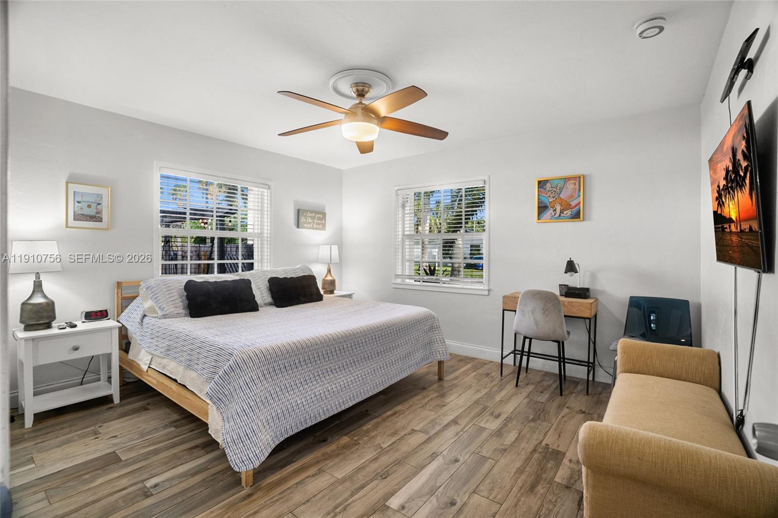 1611 Mayo Street Hollywood, FL 33020 - Photo 15 of 20 a bedroom with a bed and a couch