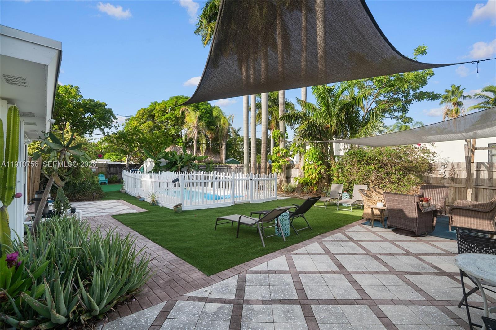 1611 Mayo Street Hollywood, FL 33020 - Photo 19 of 20 a view of a backyard with sitting area
