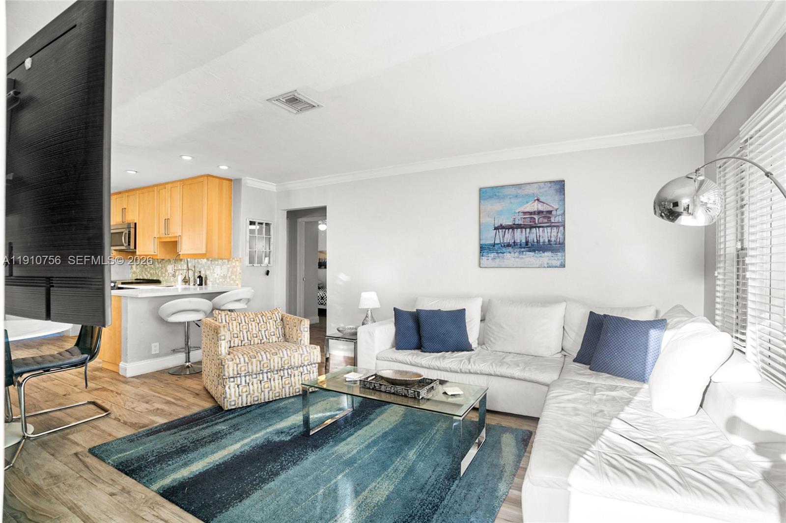 1611 Mayo Street Hollywood, FL 33020 - Photo 5 of 20 a living room with furniture and a large window