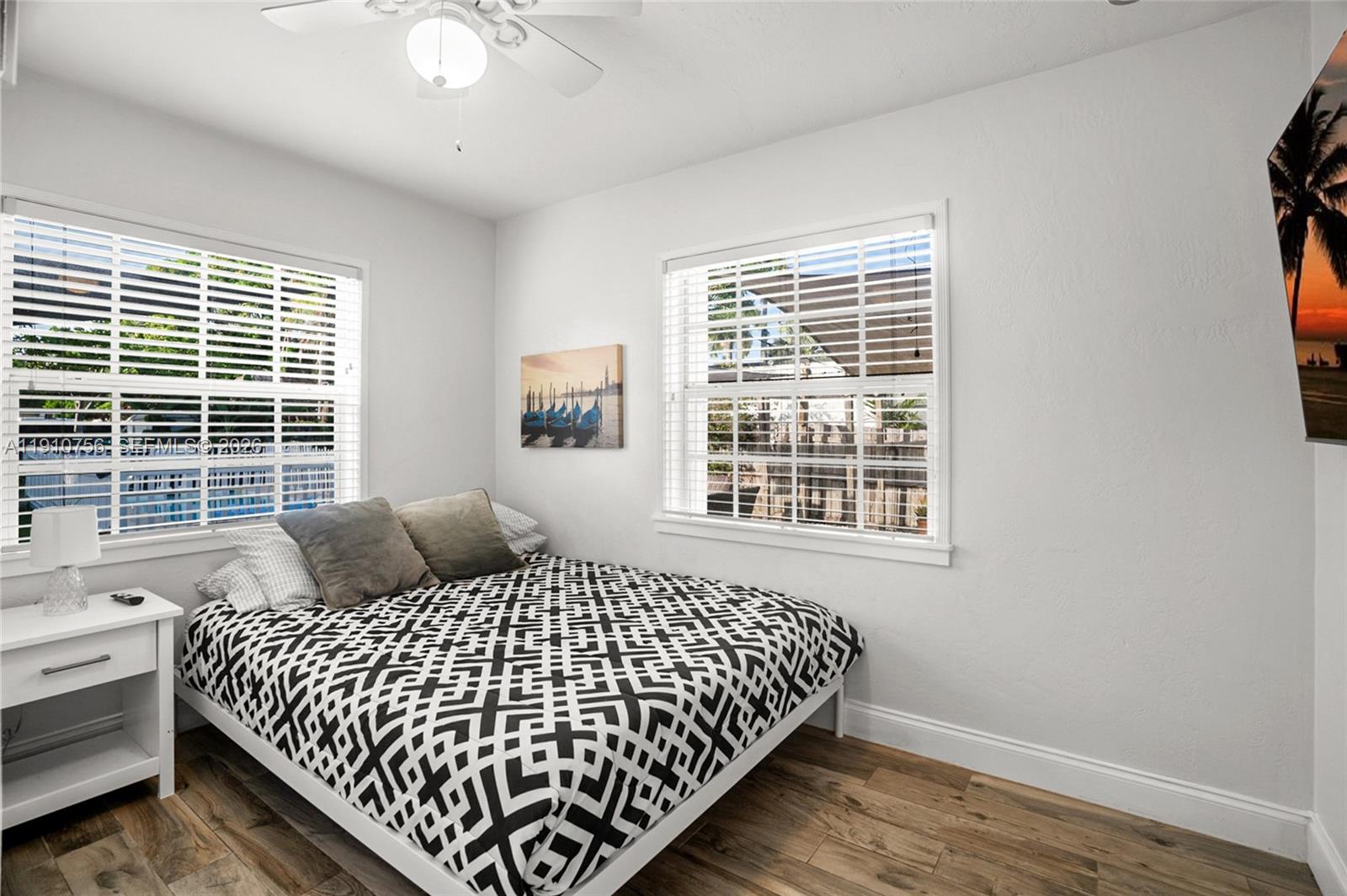 1611 Mayo Street Hollywood, FL 33020 - Photo 9 of 20 a bedroom with a bed and window