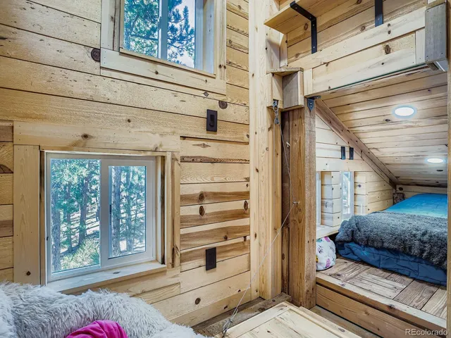 a view of front door and bedroom