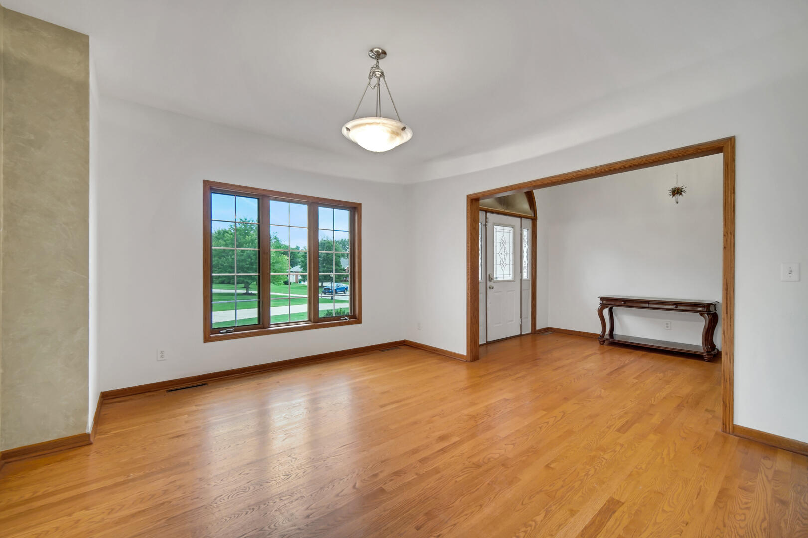 148 Timber Point Court Valparaiso, IN 46385 - Photo 11 of 30 a view of an empty room with glass door and a window