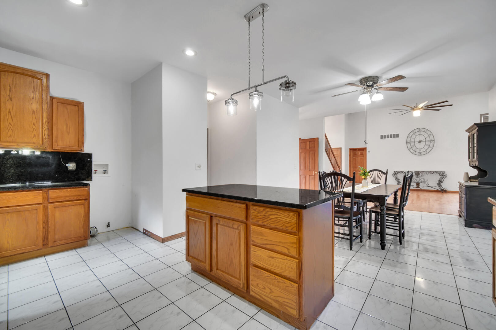 148 Timber Point Court Valparaiso, IN 46385 - Photo 15 of 30 a kitchen with stainless steel appliances granite countertop a stove a sink and a refrigerator
