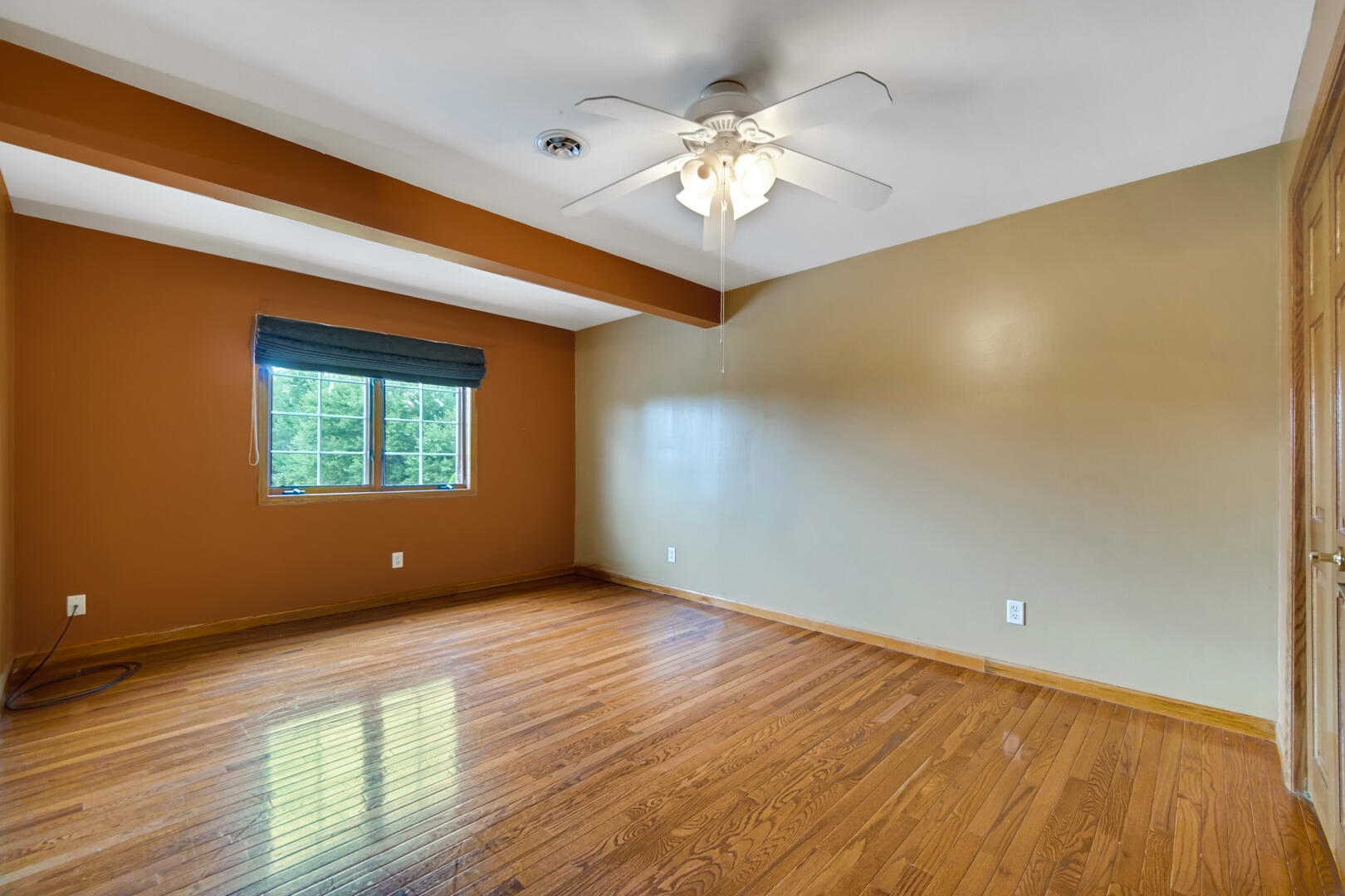 148 Timber Point Court Valparaiso, IN 46385 - Photo 18 of 30 a view of an empty room with wooden floor and a window