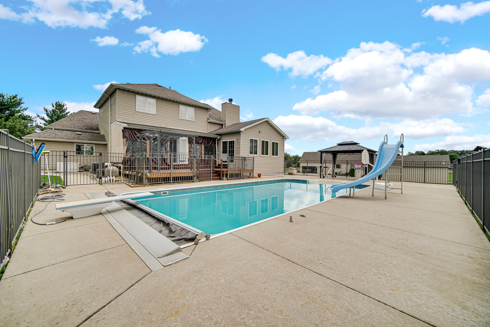 148 Timber Point Court Valparaiso, IN 46385 - Photo 28 of 30 a view of house with outdoor space and swimming pool