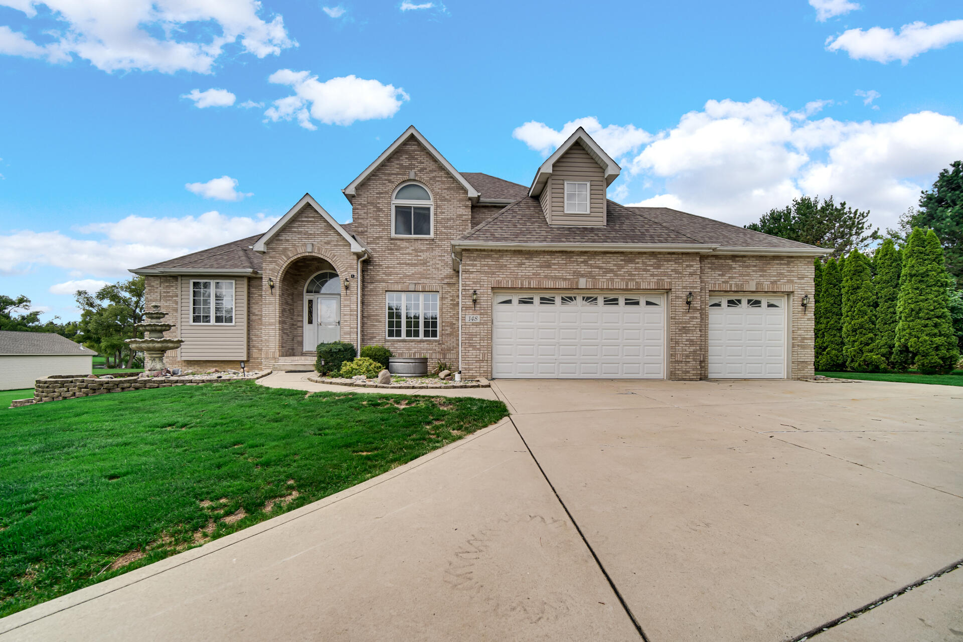 148 Timber Point Court Valparaiso, IN 46385 - Photo 30 of 30 a front view of a house with a yard and garage