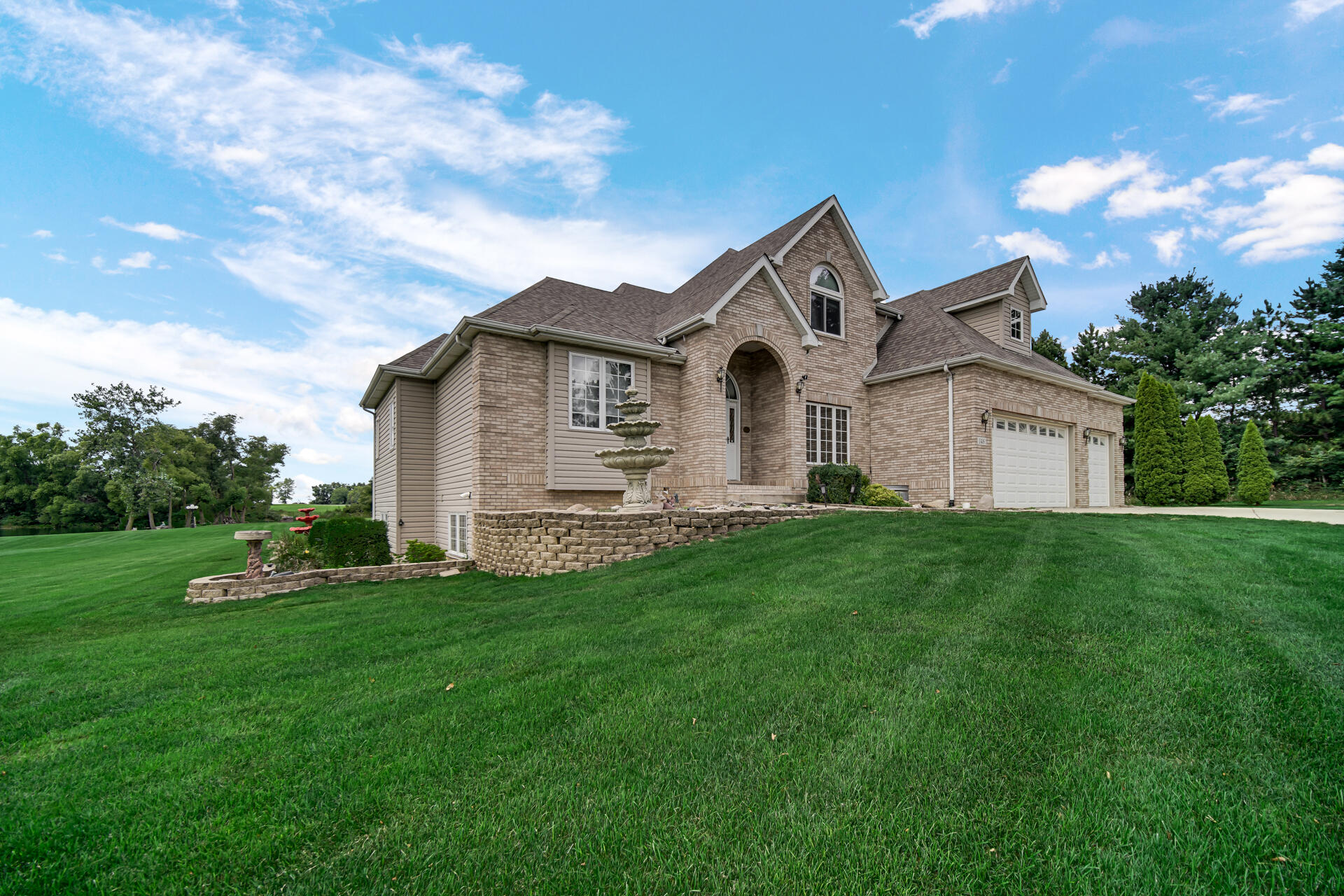 148 Timber Point Court Valparaiso, IN 46385 - Photo 6 of 30 a front view of a house with a garden
