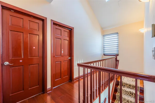 a view of a balcony with wooden floor
