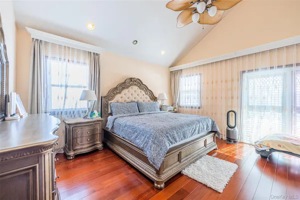 a bed room with a bed and a window