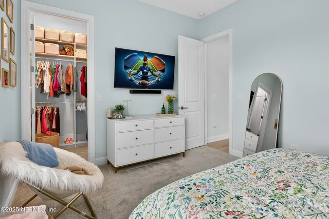 a kitchen with a stove a sink and a counter space