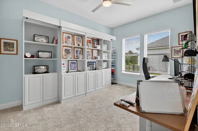 a view of a swimming pool with a yard