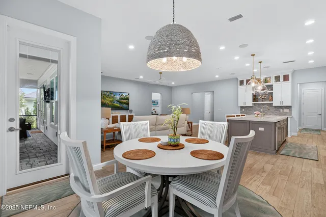 aerial view of a house with a yard