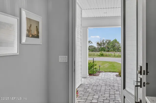 a stove top oven sitting inside of a kitchen