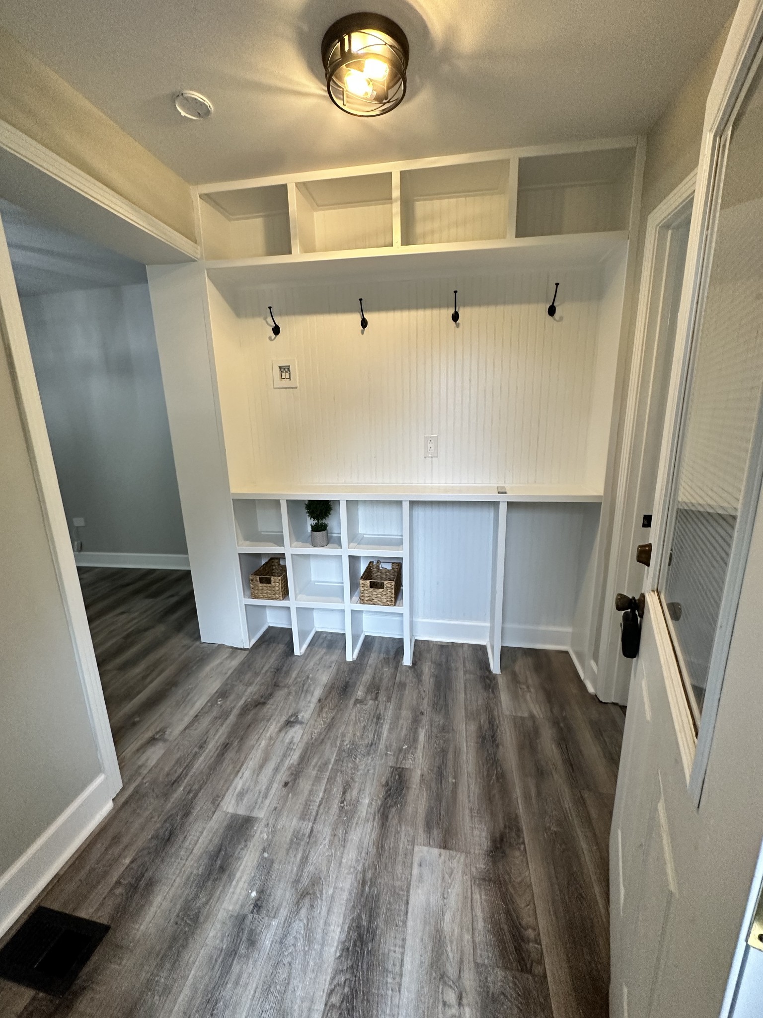 205 Excell Road Clarksville, TN 37043 - Photo 14 of 33 a view of kitchen with furniture and wooden floor