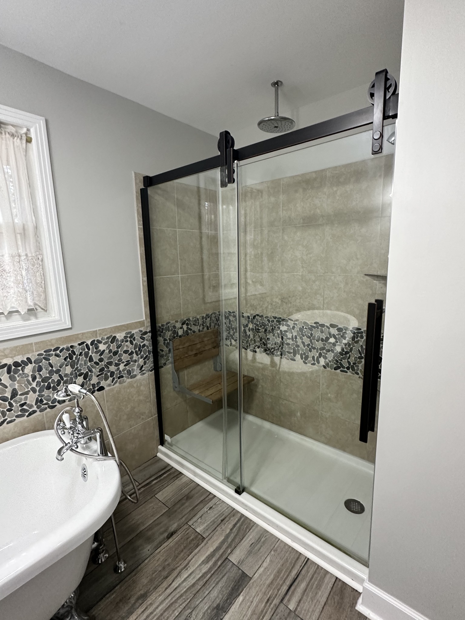 205 Excell Road Clarksville, TN 37043 - Photo 16 of 33 a bathroom with a shower and a sink