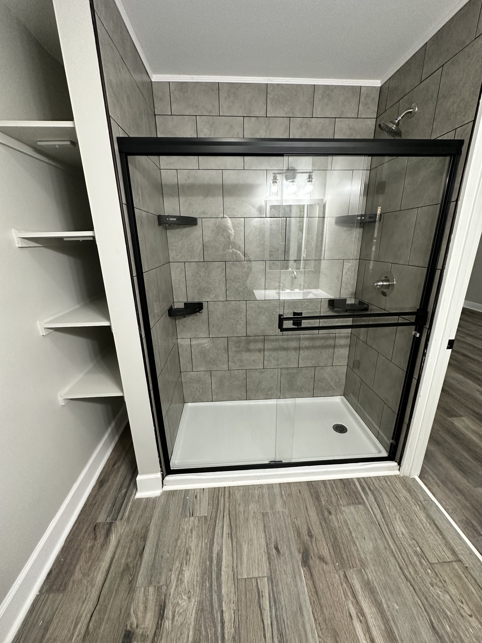 205 Excell Road Clarksville, TN 37043 - Photo 23 of 33 a bathroom with a glass door shower