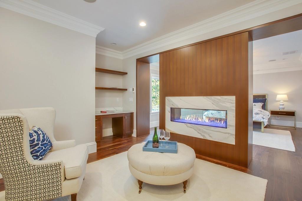 32 Forest Street Lexington, MA 02421 - Photo 13 of 23 a living room with furniture and a fireplace