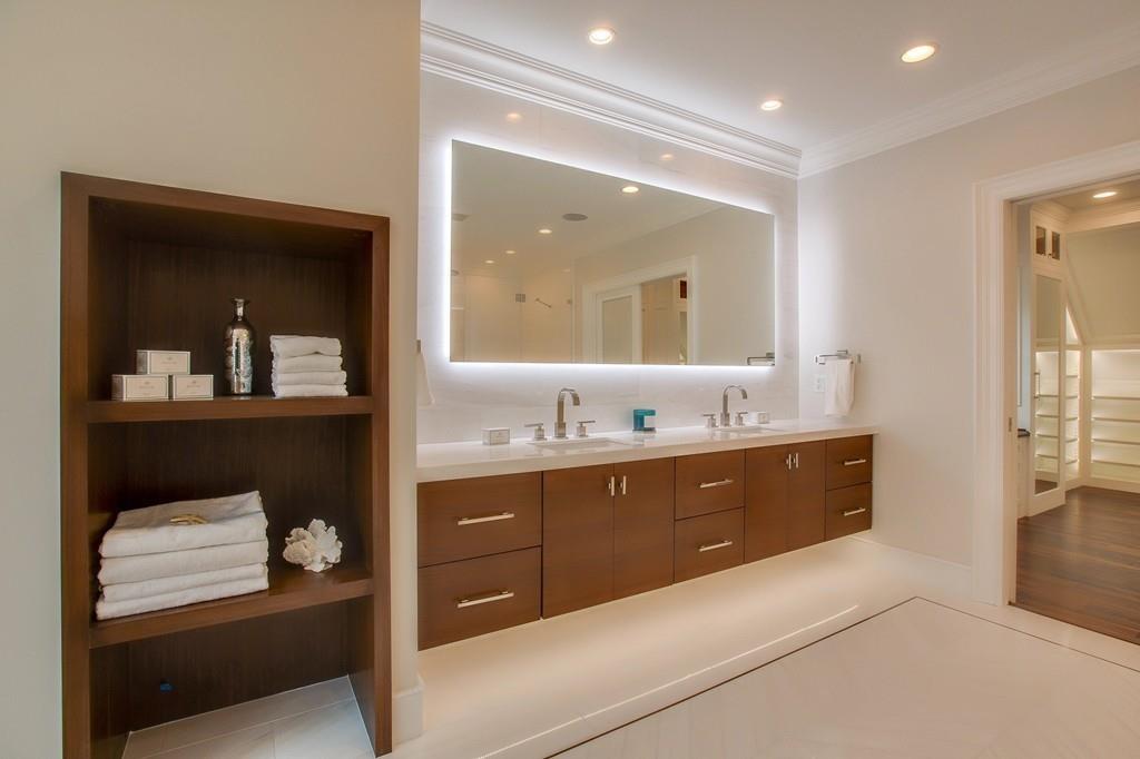 32 Forest Street Lexington, MA 02421 - Photo 15 of 23 a spacious bathroom with a granite countertop sink mirror and bathtub