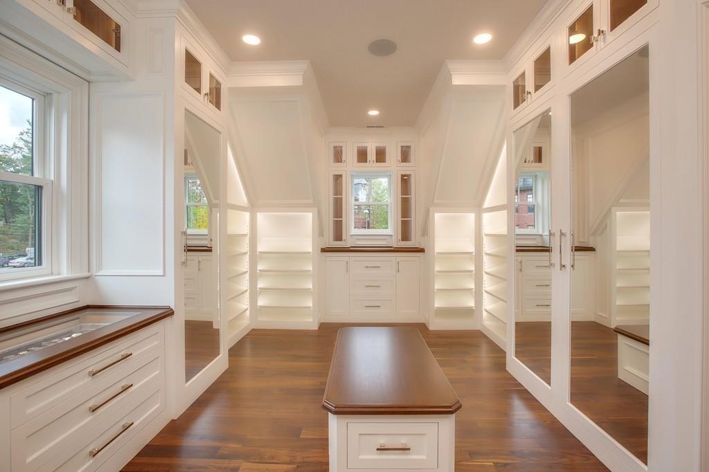 32 Forest Street Lexington, MA 02421 - Photo 16 of 23 a open kitchen with white cabinets and wooden floor