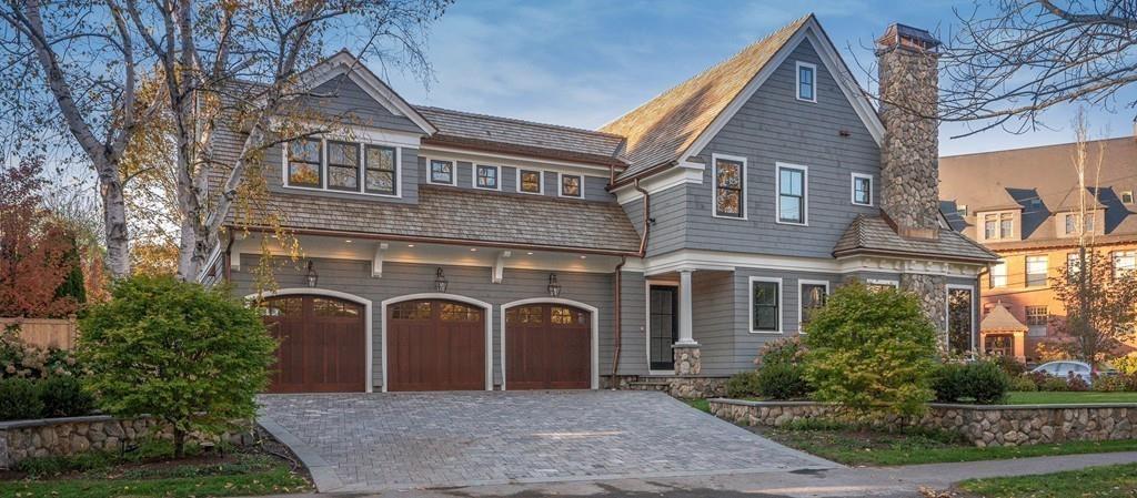32 Forest Street Lexington, MA 02421 - Photo 20 of 23 a front view of a house with a garden