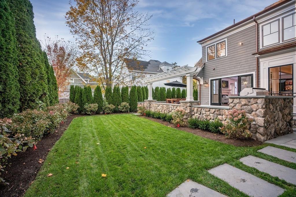 32 Forest Street Lexington, MA 02421 - Photo 21 of 23 a view of a house with a yard