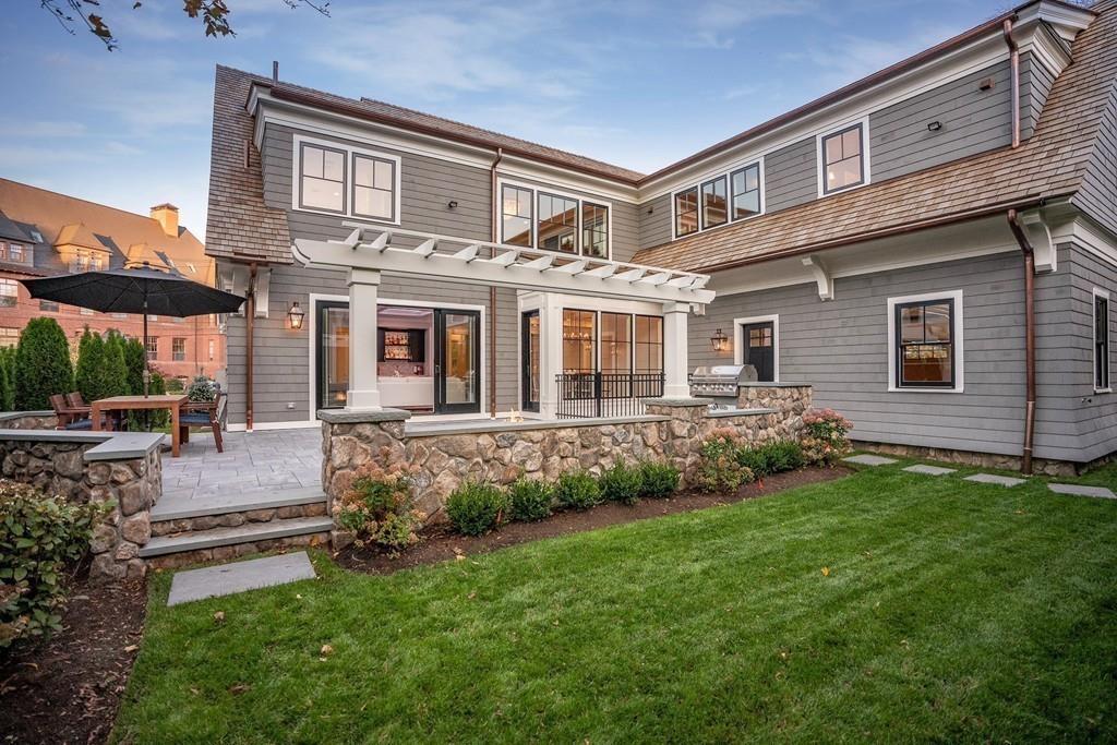 32 Forest Street Lexington, MA 02421 - Photo 22 of 23 a front view of a house with garden