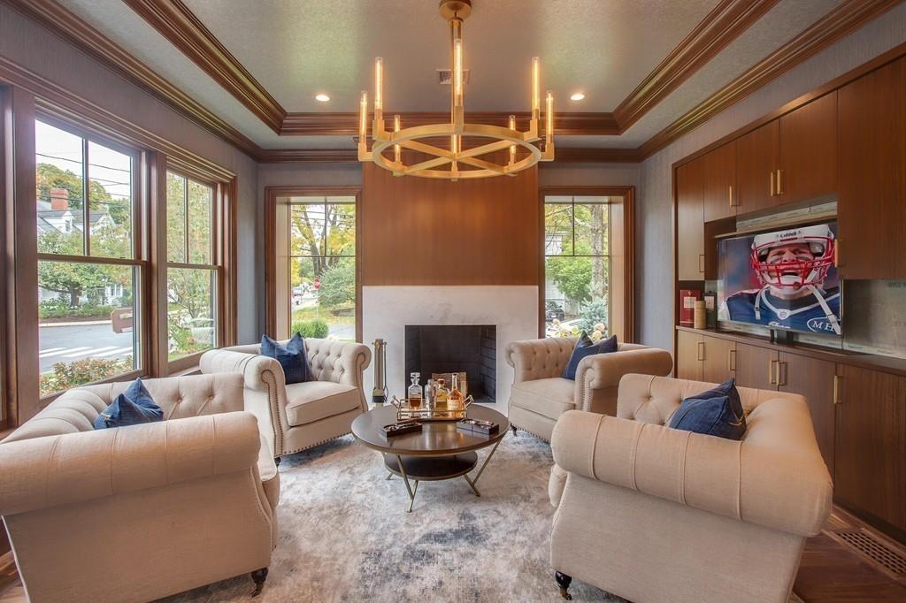 32 Forest Street Lexington, MA 02421 - Photo 9 of 23 a living room with furniture and a fireplace