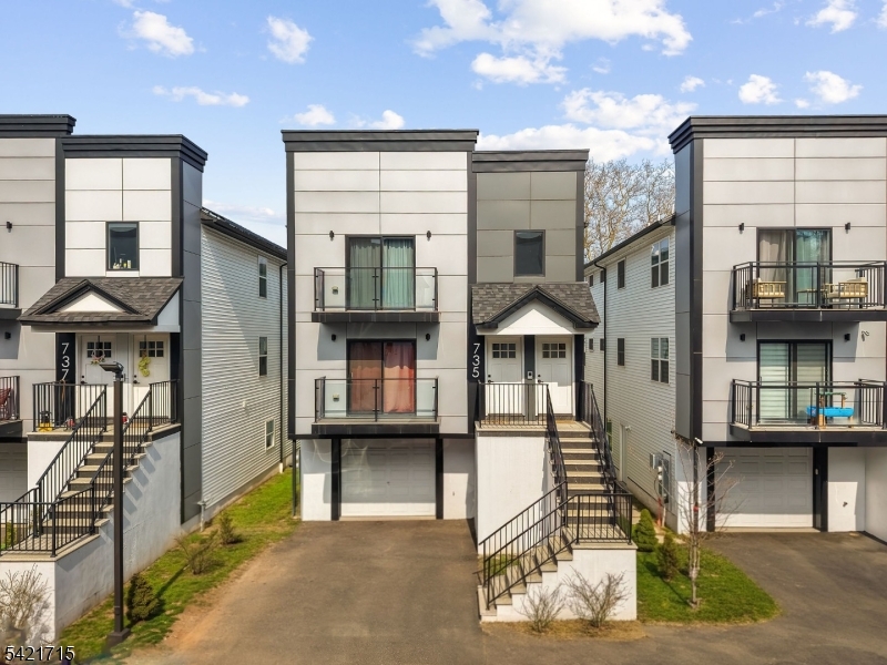 735 Seaport Drive, Unit 2 Elizabeth, NJ 07201 - Photo 1 of 28 a front view of a building with street view