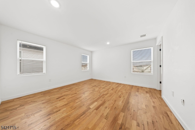 735 Seaport Drive, Unit 2 Elizabeth, NJ 07201 - Photo 20 of 28 a view of empty room with wooden floor
