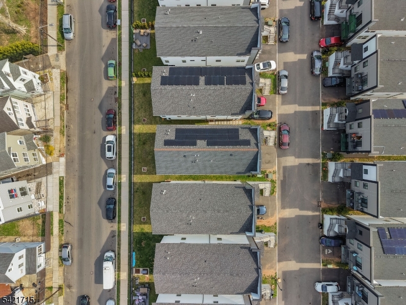 735 Seaport Drive, Unit 2 Elizabeth, NJ 07201 - Photo 4 of 28 an aerial view of residential houses with outdoor space