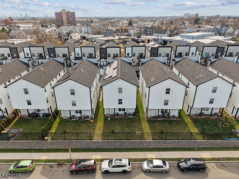 735 Seaport Drive, Unit 2 Elizabeth, NJ 07201 - Photo 5 of 28 a view of a building with cars parked