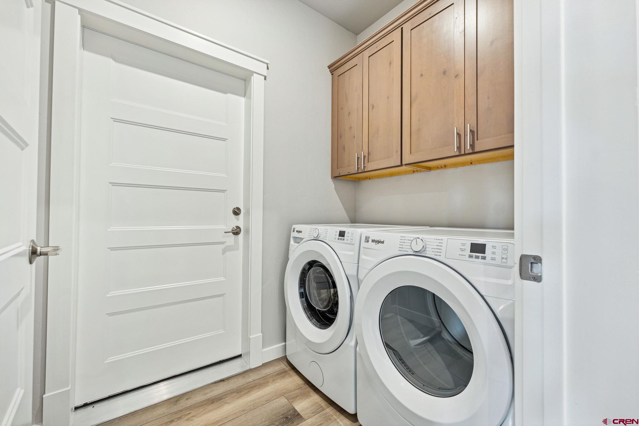 2223 Golf Course Lane Cortez, CO 81321 - Photo 19 of 26 a utility room with dryer and washer