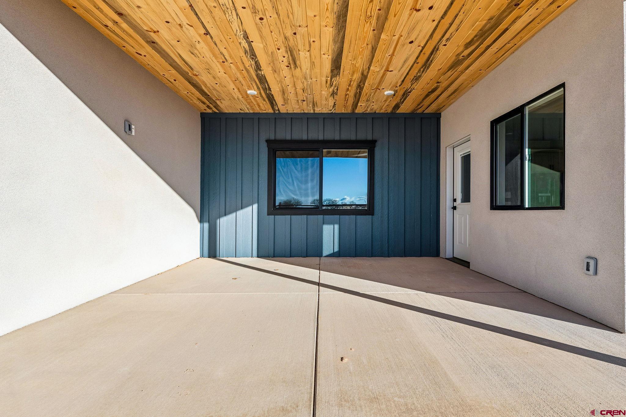 2223 Golf Course Lane Cortez, CO 81321 - Photo 22 of 26 a bedroom with a bed and a window