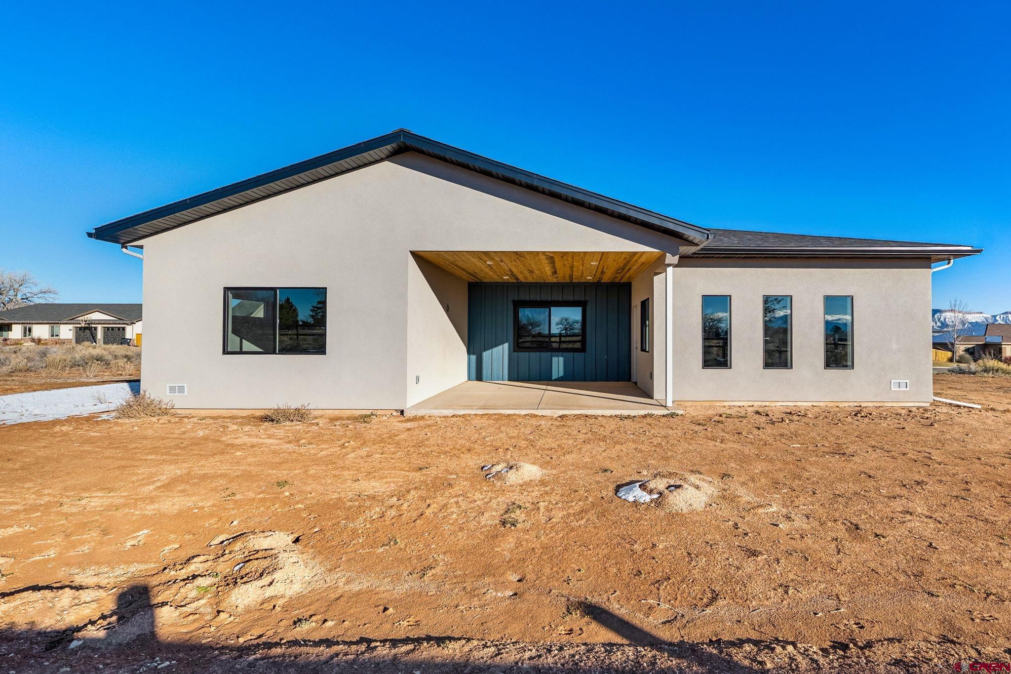 2223 Golf Course Lane Cortez, CO 81321 - Photo 3 of 26 a view of an house with backyard of house