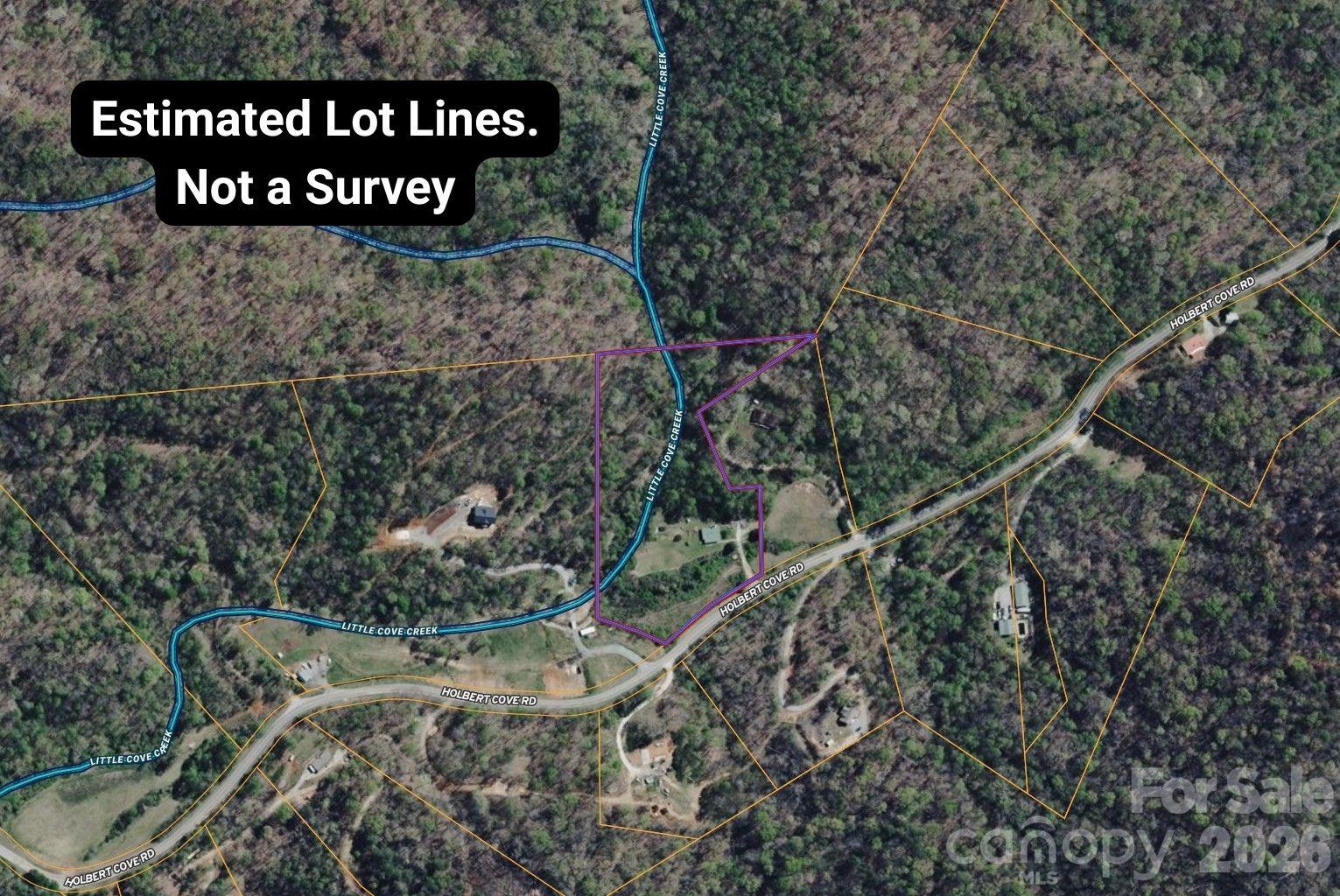 5712 Holbert Cove Road Saluda, NC 28773 - Photo 17 of 17 a sign that is sitting on a brick wall