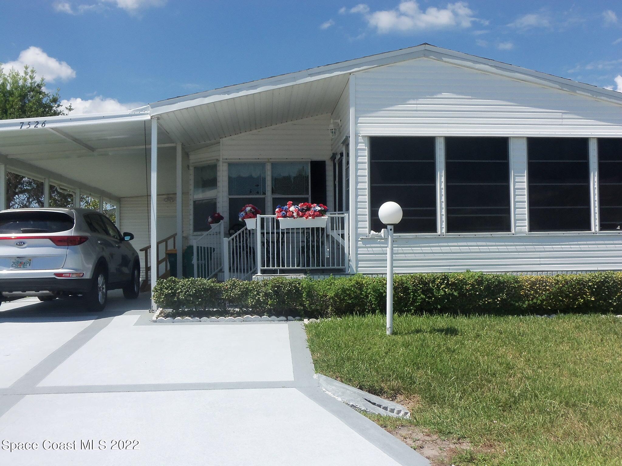 7526 Cedar Bark Road Micco, FL 32976 - Photo 1 of 16 Front of home