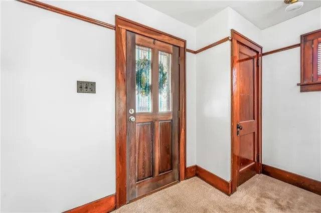 a view of an entryway with staircase