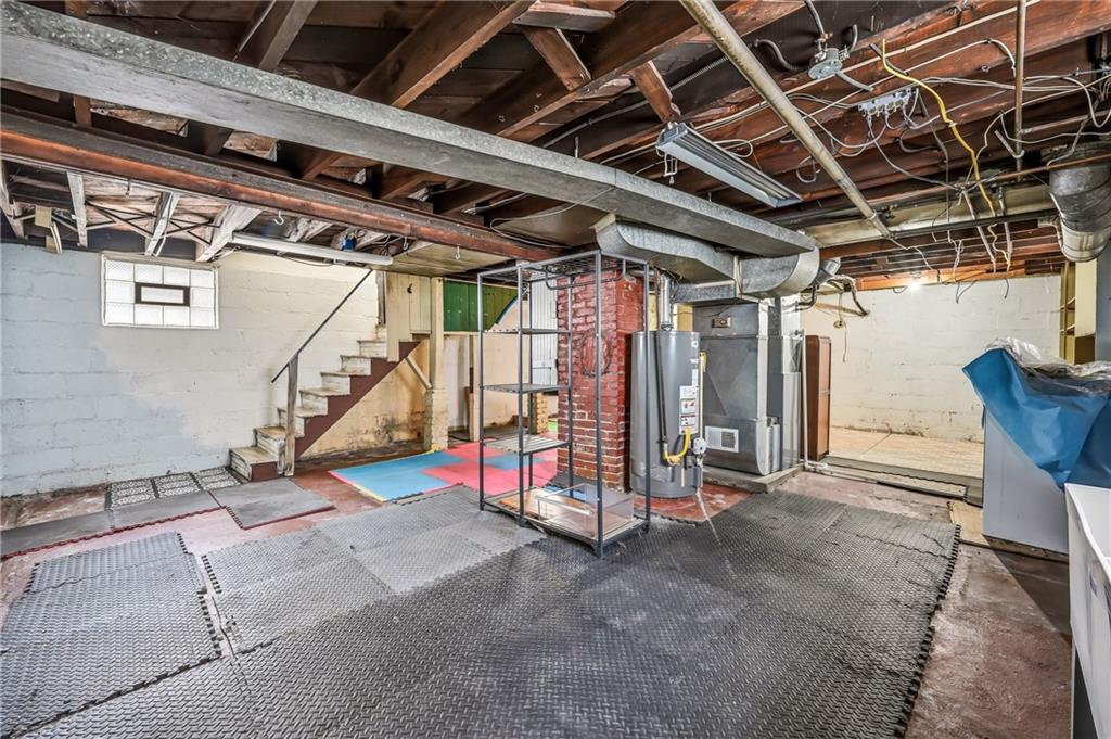 486 Tamplin Street Sharon, PA 16146 - Photo 35 of 37 a view of an empty room with wooden floor