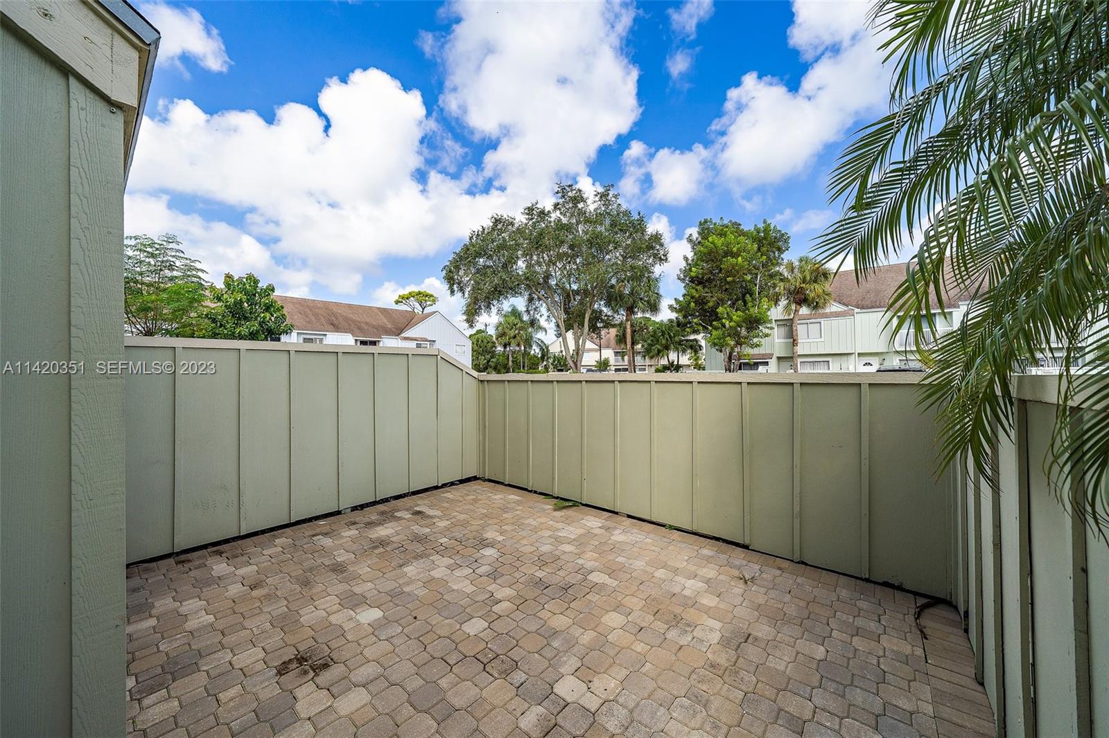 6351 Riverwalk Lane, Unit 4 Jupiter, FL 33458 - Photo 12 of 40 a view of a backyard