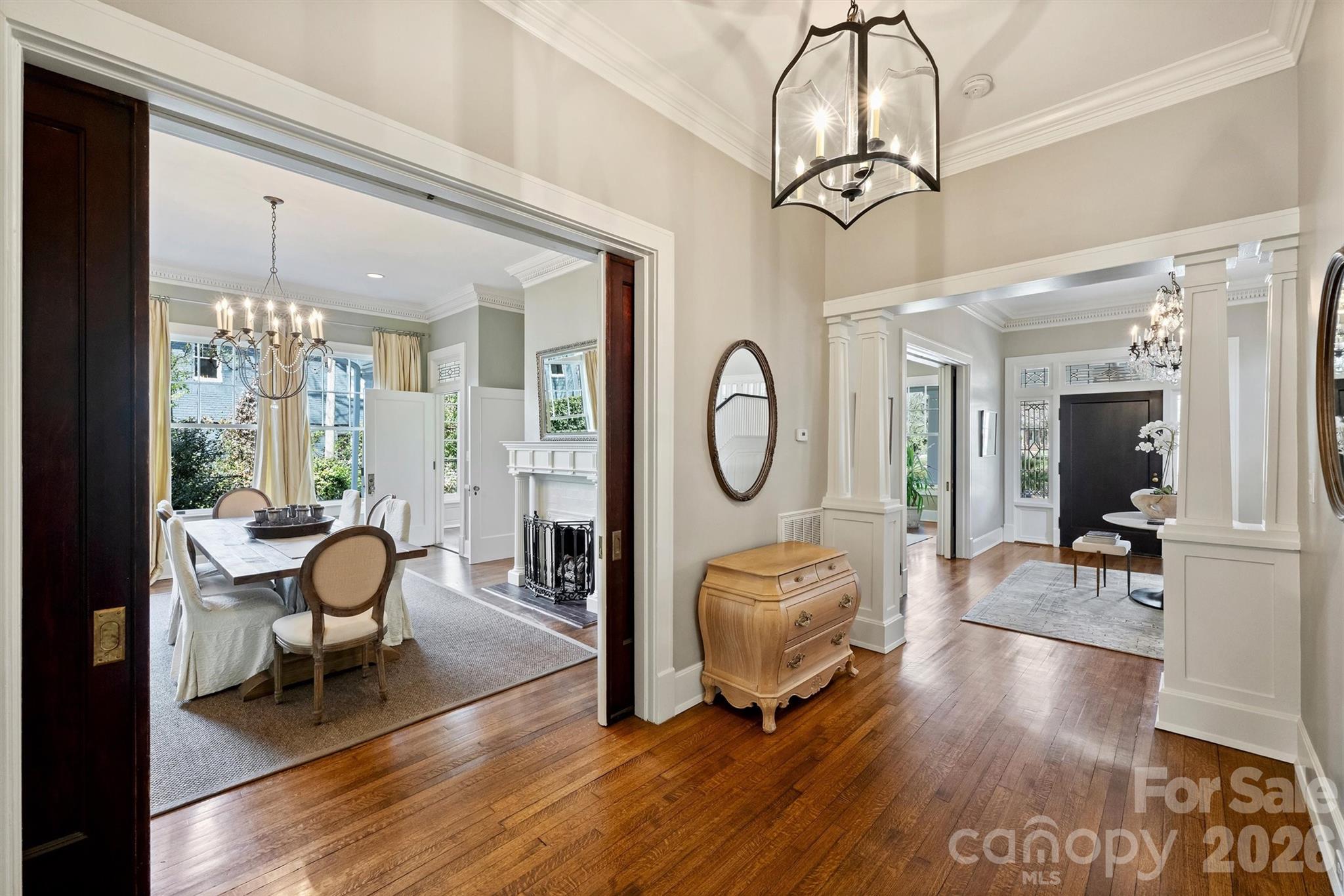 1136 Queens Road Charlotte, NC 28207 - Photo 17 of 43 a living room filled with furniture and floor to ceiling window