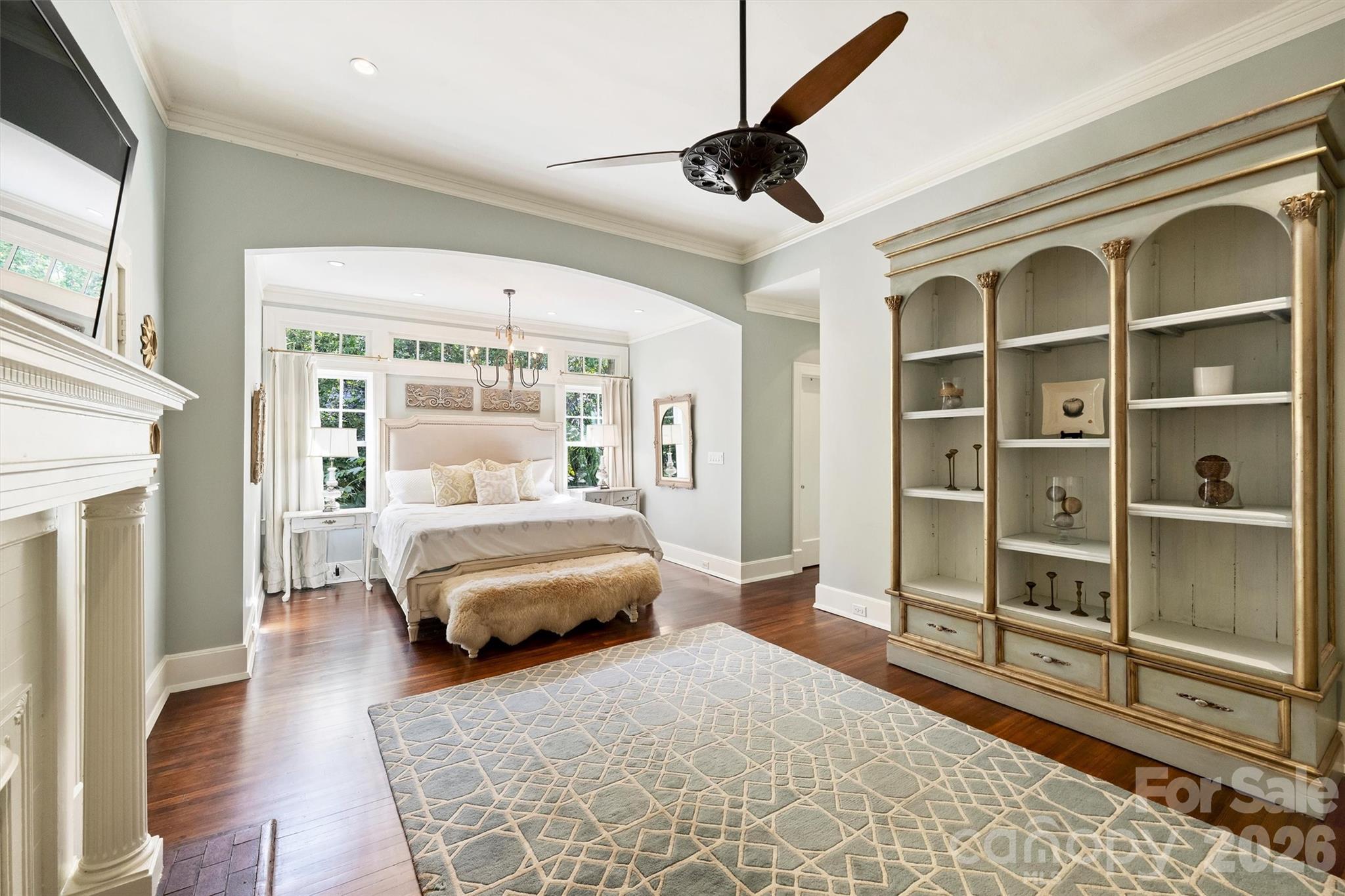 1136 Queens Road Charlotte, NC 28207 - Photo 18 of 43 a spacious bedroom with a bed and a walk in closet