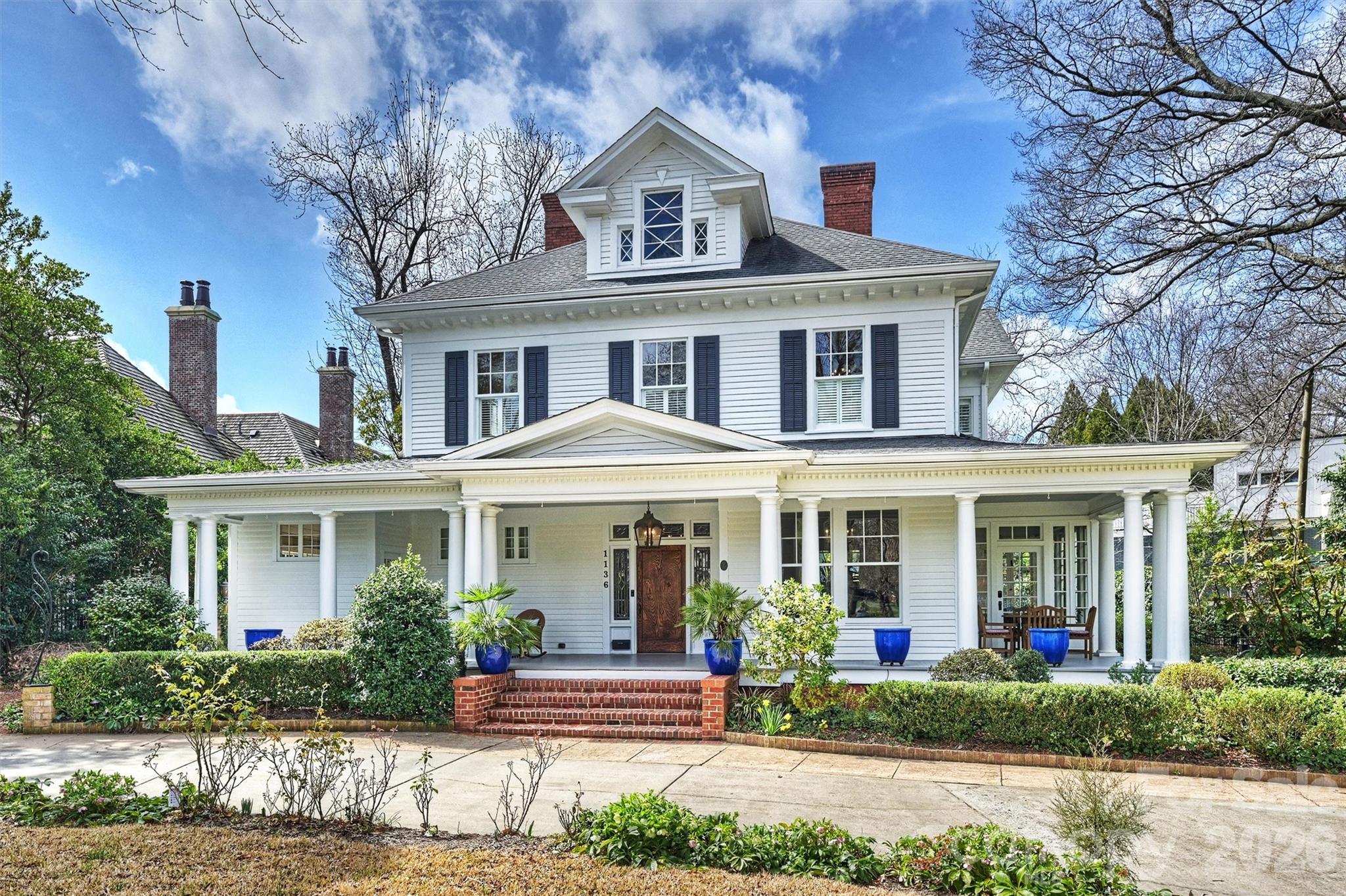 1136 Queens Road Charlotte, NC 28207 - Photo 2 of 43 front view of house with a yard