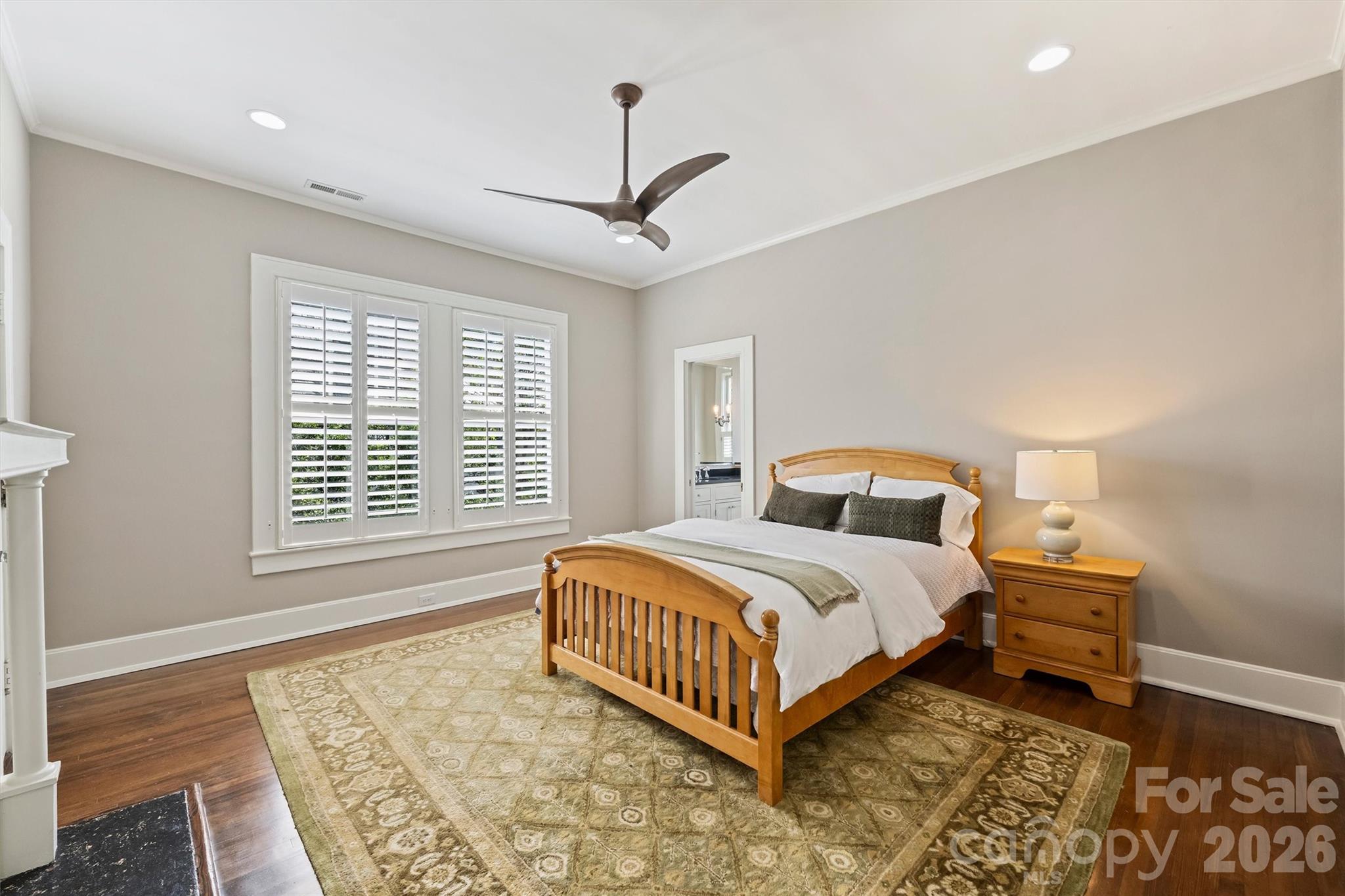 1136 Queens Road Charlotte, NC 28207 - Photo 24 of 43 a bedroom with a bed and window