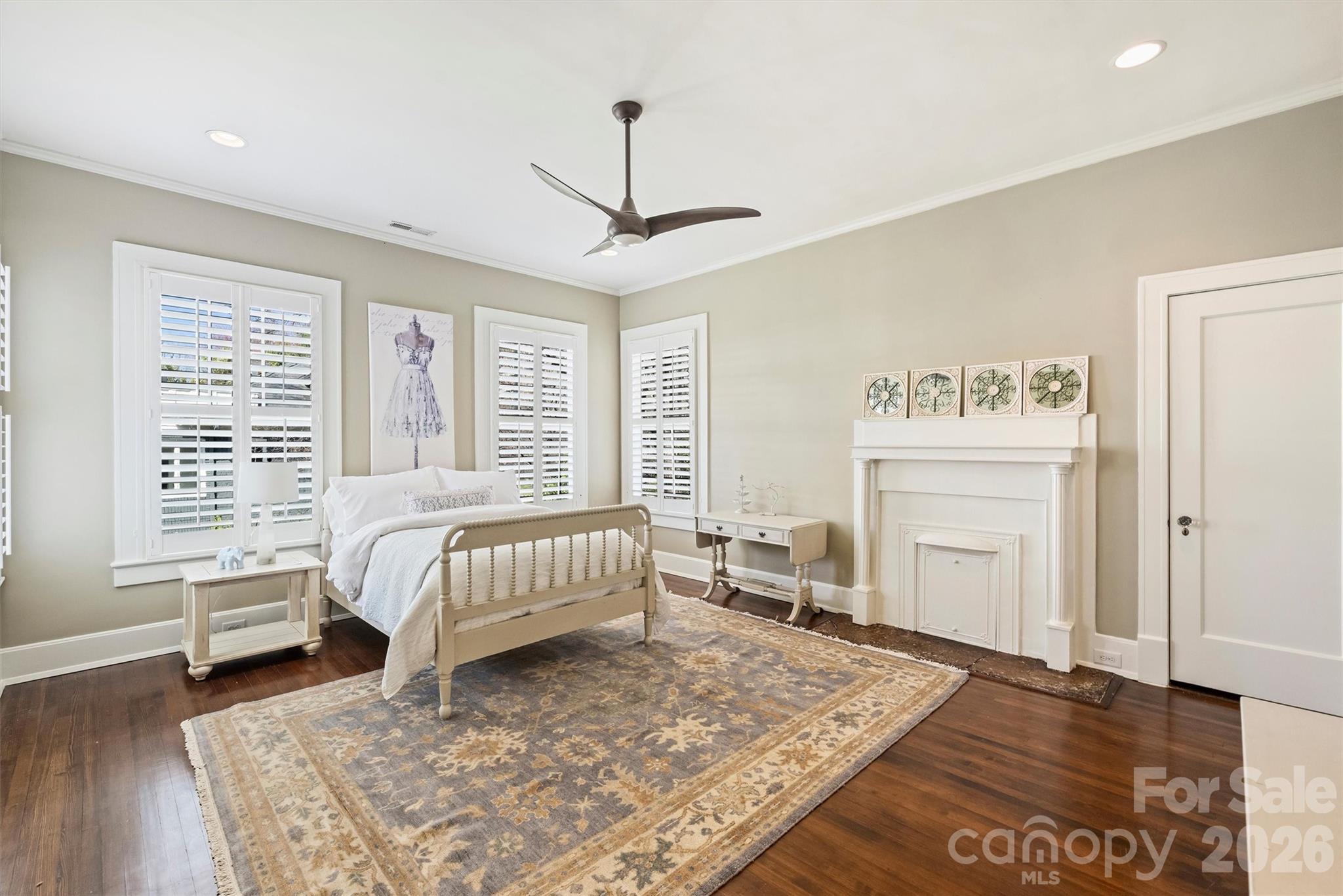 1136 Queens Road Charlotte, NC 28207 - Photo 26 of 43 a bed room with a bed furniture and a window