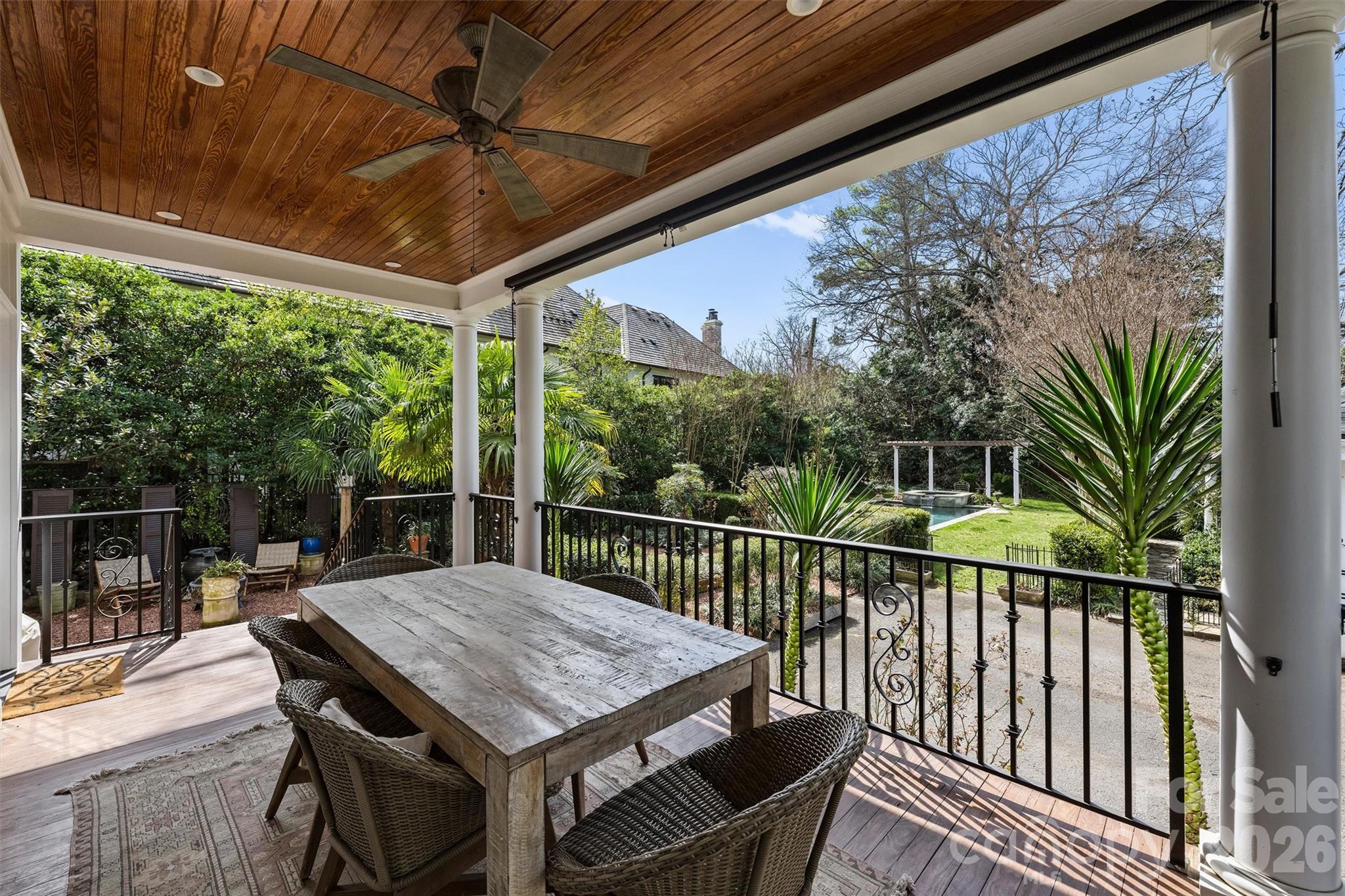 1136 Queens Road Charlotte, NC 28207 - Photo 34 of 43 a view of a patio with a table chairs and a table