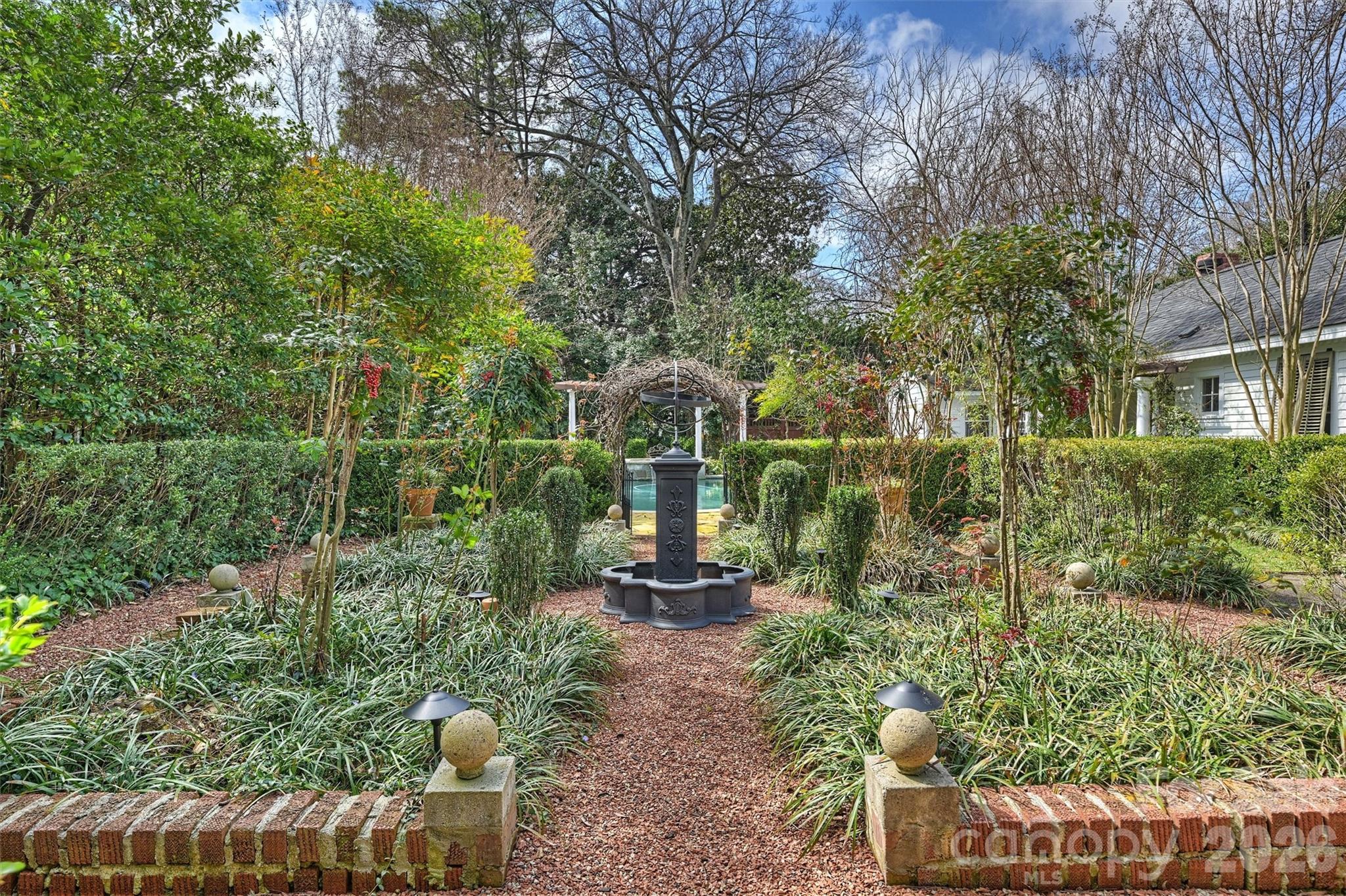 1136 Queens Road Charlotte, NC 28207 - Photo 36 of 43 a front view of a house with a yard