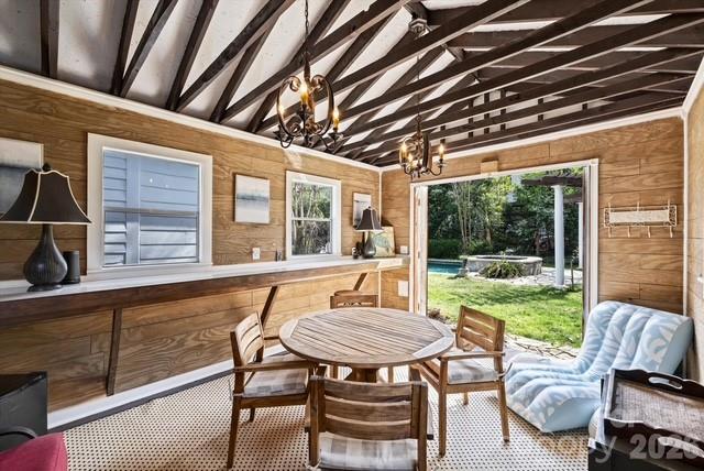 1136 Queens Road Charlotte, NC 28207 - Photo 43 of 43 a view of a patio with a table chairs and a backyard