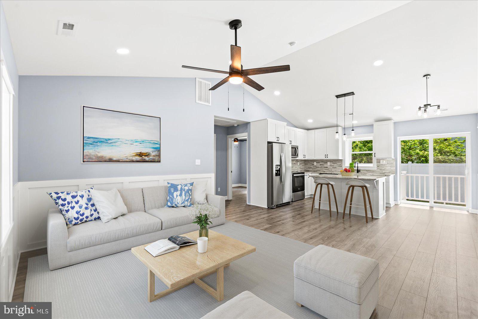 408 Wirt Street Colonial Beach, VA 22443 - Photo 7 of 48 Bright and airy open-concept living space.