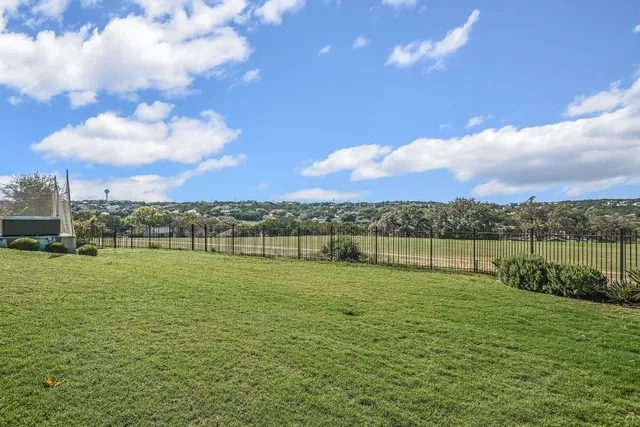 a front view of house with yard and outdoor seating